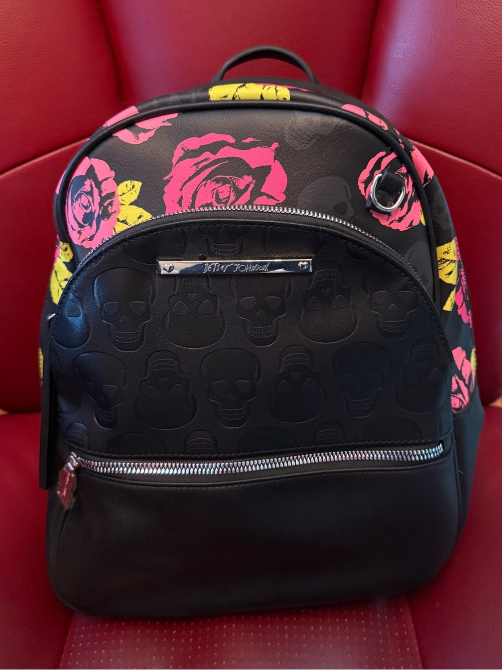 Betsey Johnson Black Backpack with Pink & Yellow Roses and Embossed Skulls
